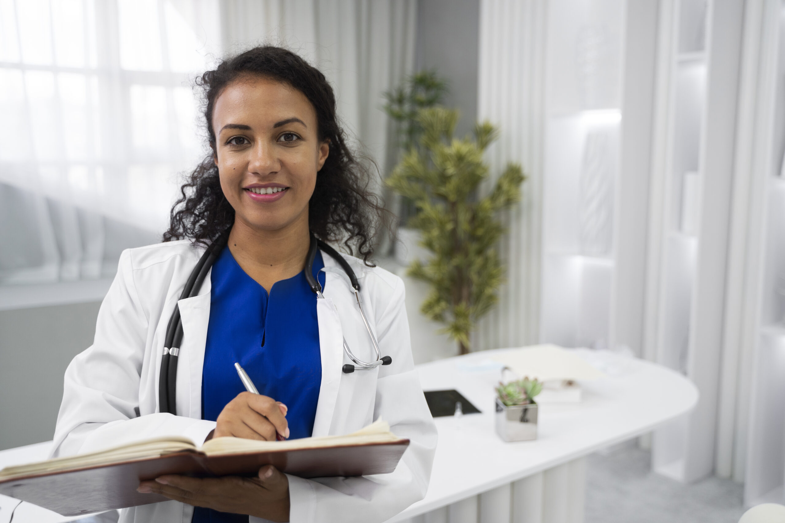 healthcare professional and elderly lady on stairs