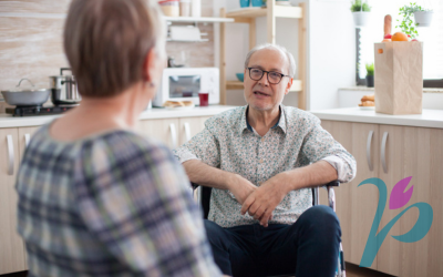 Two people at a booth for Parkinson Society BC