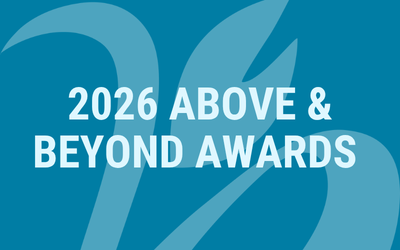 Two people at a booth for Parkinson Society BC