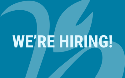 Two people at a booth for Parkinson Society BC